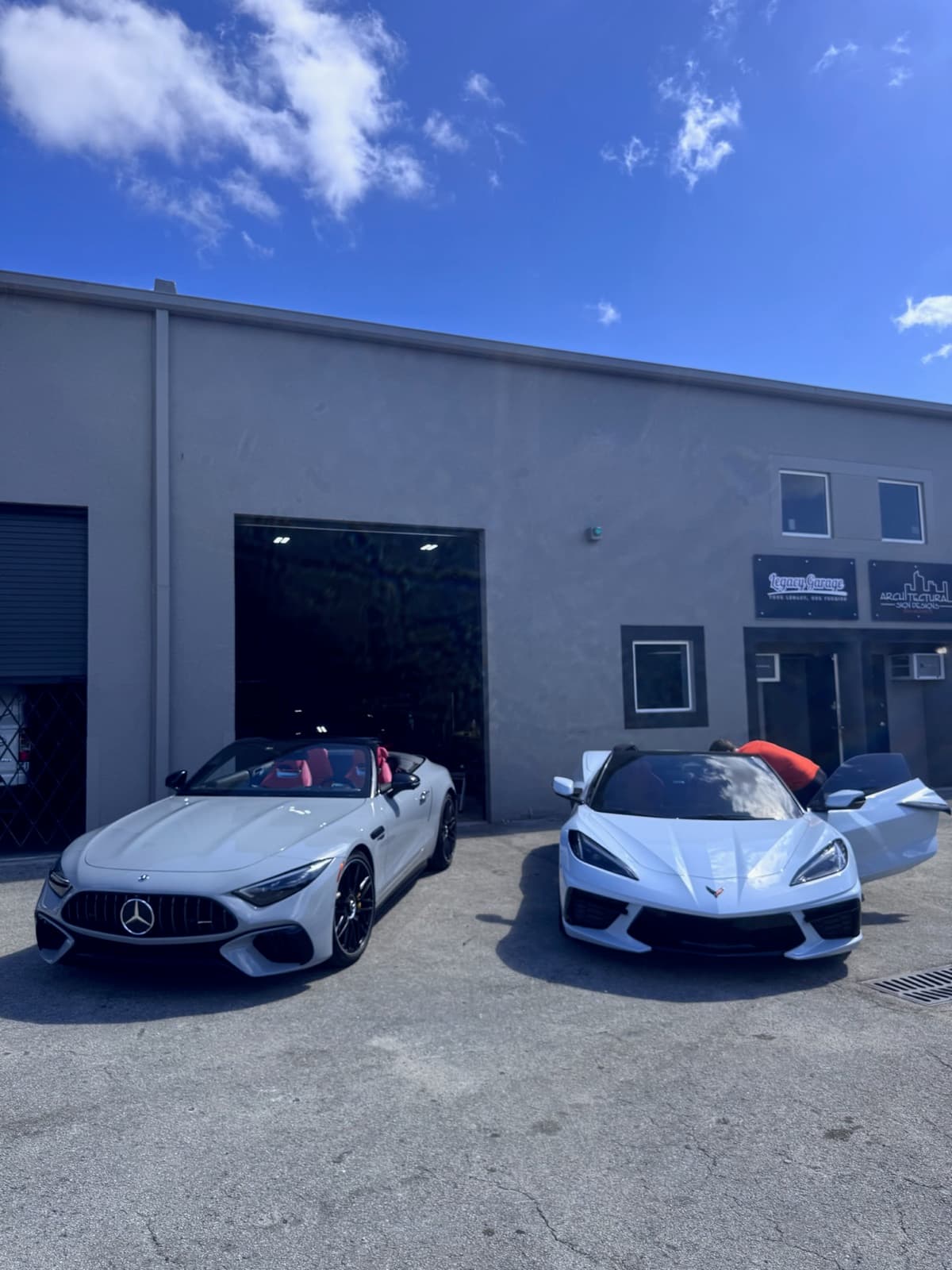 Mercedes AMG SL and Corvette outside Dr. Tints Miami shop